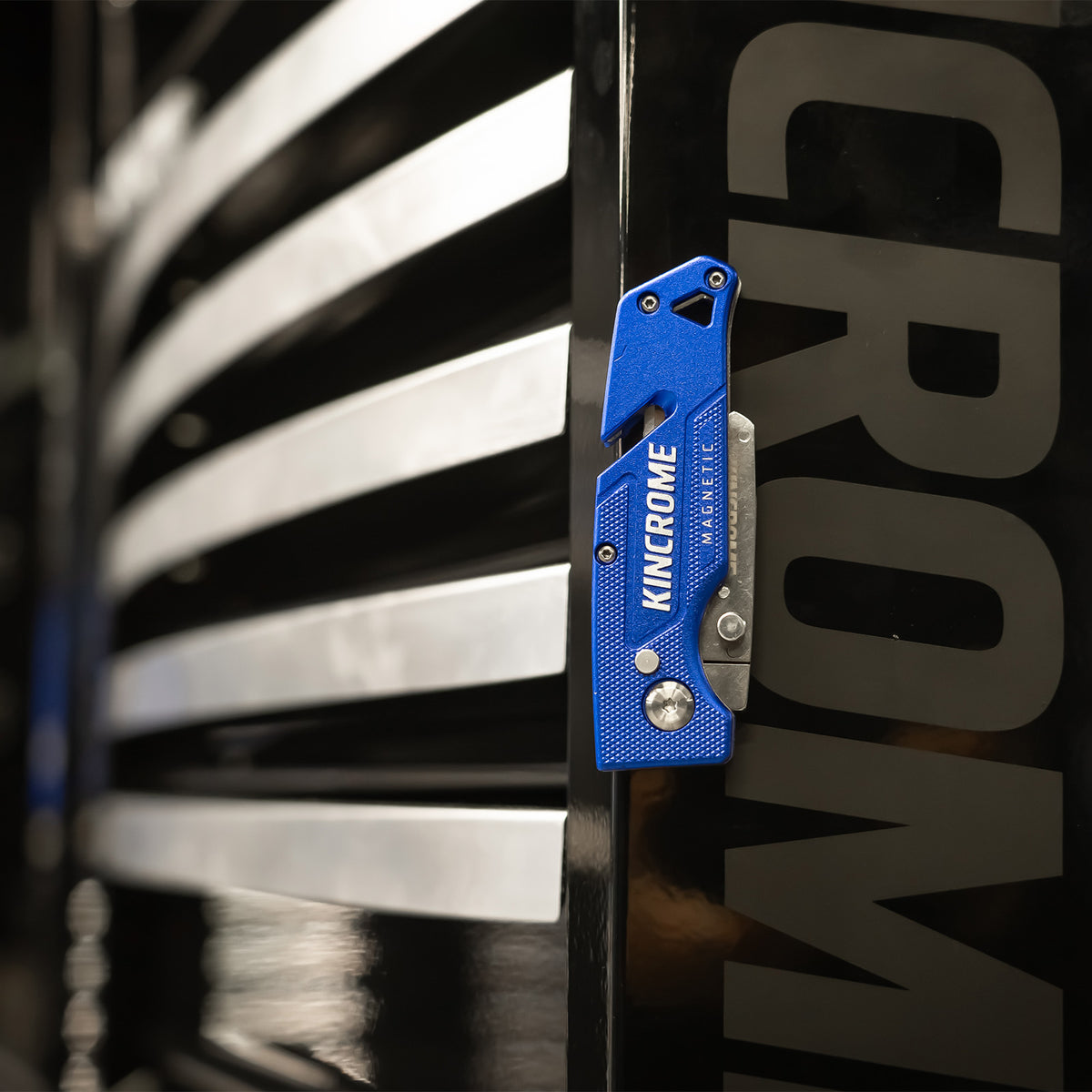 This is an image of a blue Kincrome magnetic utility knife on black Cromwell tool chest at Kennedys Welding Supplies Derwent Park TAS