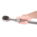 This is an image of a hand holding a chrome ratchet wrench, tool from Kennedys Welding Supplies in Derwent Park TAS
