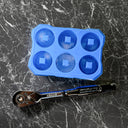 This is an image of a Kincrome ratchet wrench and a blue ice cube tray on a black marble surface, Kennedys Welding Supplies, Derwent Park TAS