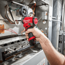 This is an image of a hand using a Milwaukee Fuel power tool to repair industrial equipment, showcasing Kennedys Welding Supplies services in Derwent Park TAS