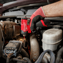 This is an image of a hand using a Milwaukee power tool on a vehicle engine, showcasing Kennedys Welding Supplies in Derwent Park TAS offering tool shop, power tool repairs, and welding specialists