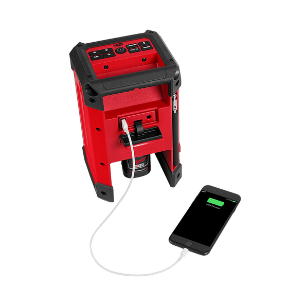 This is an image of a red Milwaukee M12 Radio/Charger charging a smartphone, featured by Kennedys Welding Supplies in Derwent Park TAS, tool shop and welding specialists.