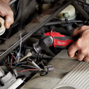 This is an image of a Milwaukee soldering iron being used on car engine wiring, showcasing tool repair at Kennedys Welding Supplies, Derwent Park TAS