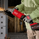 This is an image of a person using a red Milwaukee M18 cordless angle grinder, featured by Kennedys Welding Supplies in Derwent Park TAS, experts in welding, tool shop, and power tool repairs.