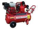 This is an image of a red Trade Series Peerless air compressor with Honda GX engine, offered by Kennedys Welding Supplies in Derwent Park, TAS, specializing in tool shop, welding, and power tool repairs.